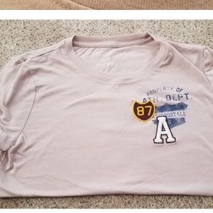 a peach colored plain tee